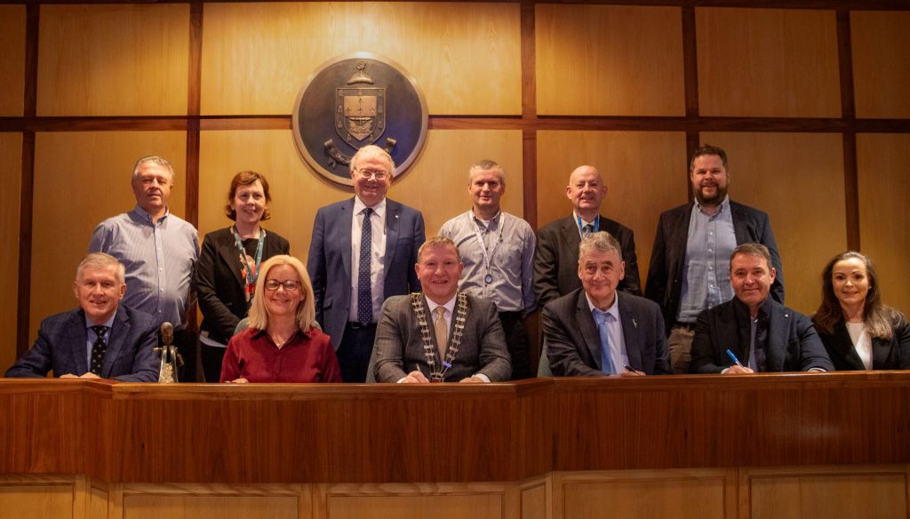Group photo of contract signing